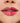 Pielęgnująca pomadka do ust o delikatnym połysku w odcieniu czerwonym - Sleek Lip Balm Scarlet